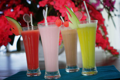 Close-up of colorful drinks on table