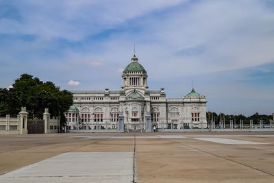 Building against cloudy sky