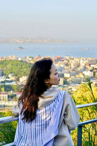 Side view of woman looking away