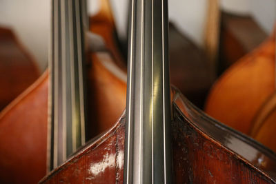 Lots of double basses at a luthier's