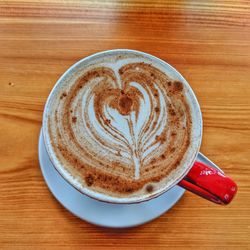 High angle view of cappuccino on table