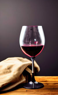 Close-up of wineglass on table