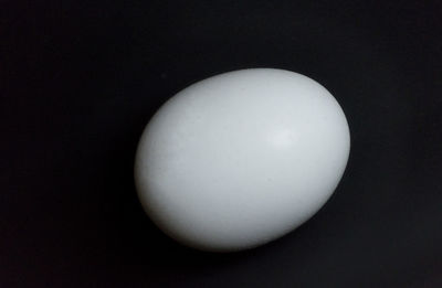 Close-up of lamp against black background