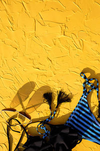 Full frame shot of yellow painting on wall