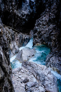 High angle view of rocks in sea