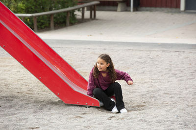 Girl on slide at playground