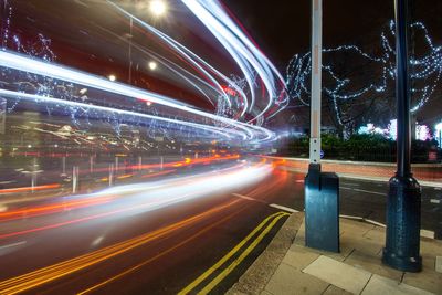 Light trails on city street at night