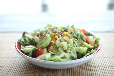 Close-up of salad in bowl on table