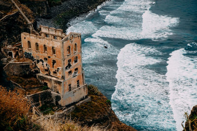 High angle view of old building by sea