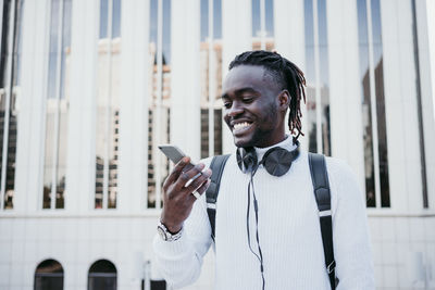 Young man using smart phone