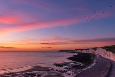 Scenic view of sea against sky during sunset