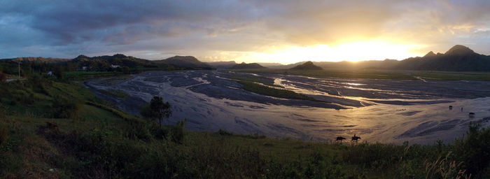 Panoramic view of landscape against sky during sunset