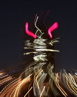 Close-up of light trails against black background