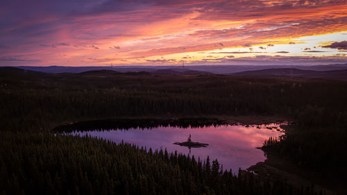 Scenic view of landscape against sky during sunset