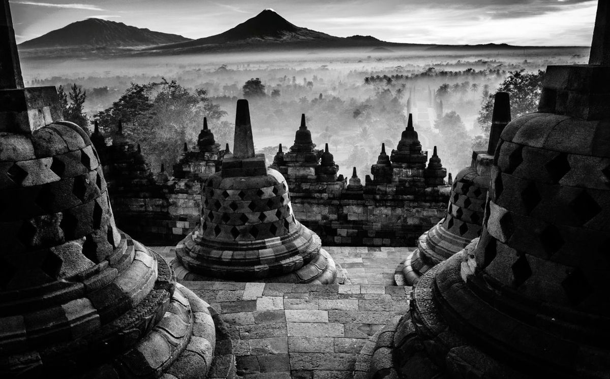 black and white, architecture, religion, temple - building, history, monochrome, monochrome photography, travel destinations, belief, the past, built structure, ancient, travel, spirituality, sky, place of worship, building, cloud, nature, darkness, building exterior, tourism, no people, black, environment, landscape, outdoors, mountain, temple, old, pagoda