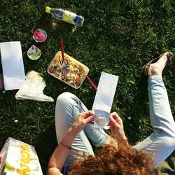 Directly above shot of woman sitting with pasta