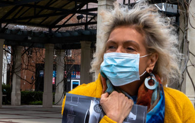 Portrait of woman in city