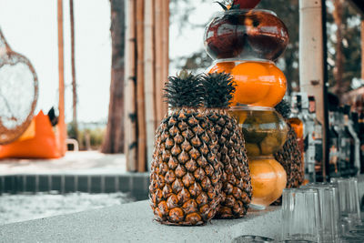 Close-up of orange fruits in container