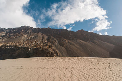 Scenic view of desert against sky