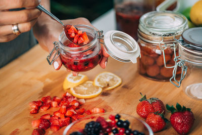 Fermentation food at home. woman preparing fruits for fermentation.