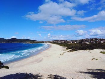 Scenic view of beach against sky