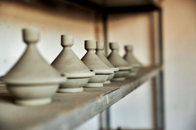 Close-up of chess pieces on table