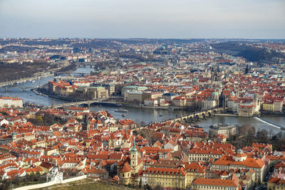 High angle view of river amidst buildings in town