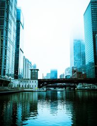 Low angle view of city at waterfront