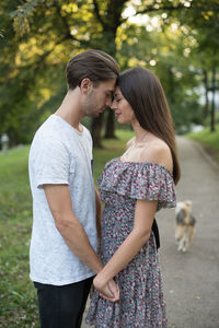 Young couple standing outdoors