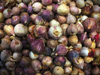 Full frame shot of onions for sale at market stall