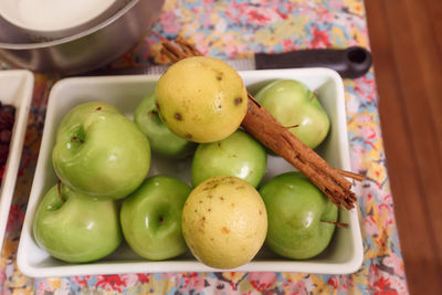 High angle view of fruits in bowl on table