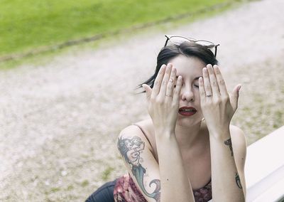 Portrait of young woman outdoors