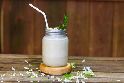 Close-up of drink in mason jar on table