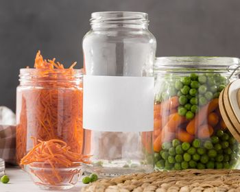 Close-up of food in jars on table