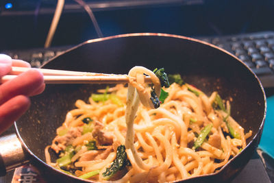 Close-up of hand holding food