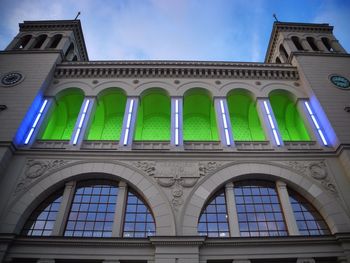 Low angle view of building against blue sky