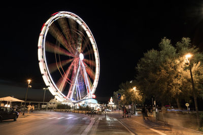 View of the ferris wheel of rimini with all the colored lights
