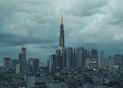 Landmark81 against the pale grey sky at hochiminh city