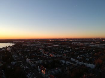 High angle view of townscape against sky during sunset