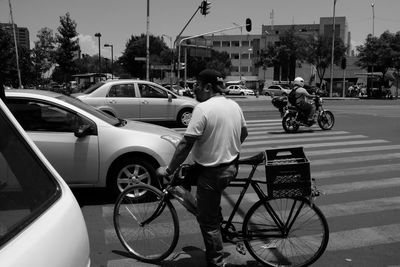 Cars parked on road in city