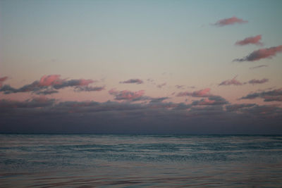 Scenic view of sea against sky at sunset