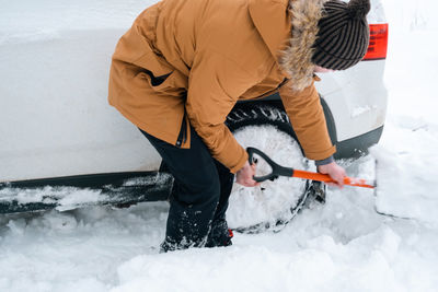 A man digs out