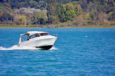 Motorboat speeding on a lake