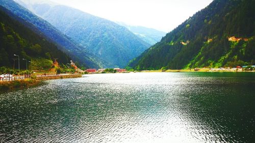 Scenic view of river and mountains