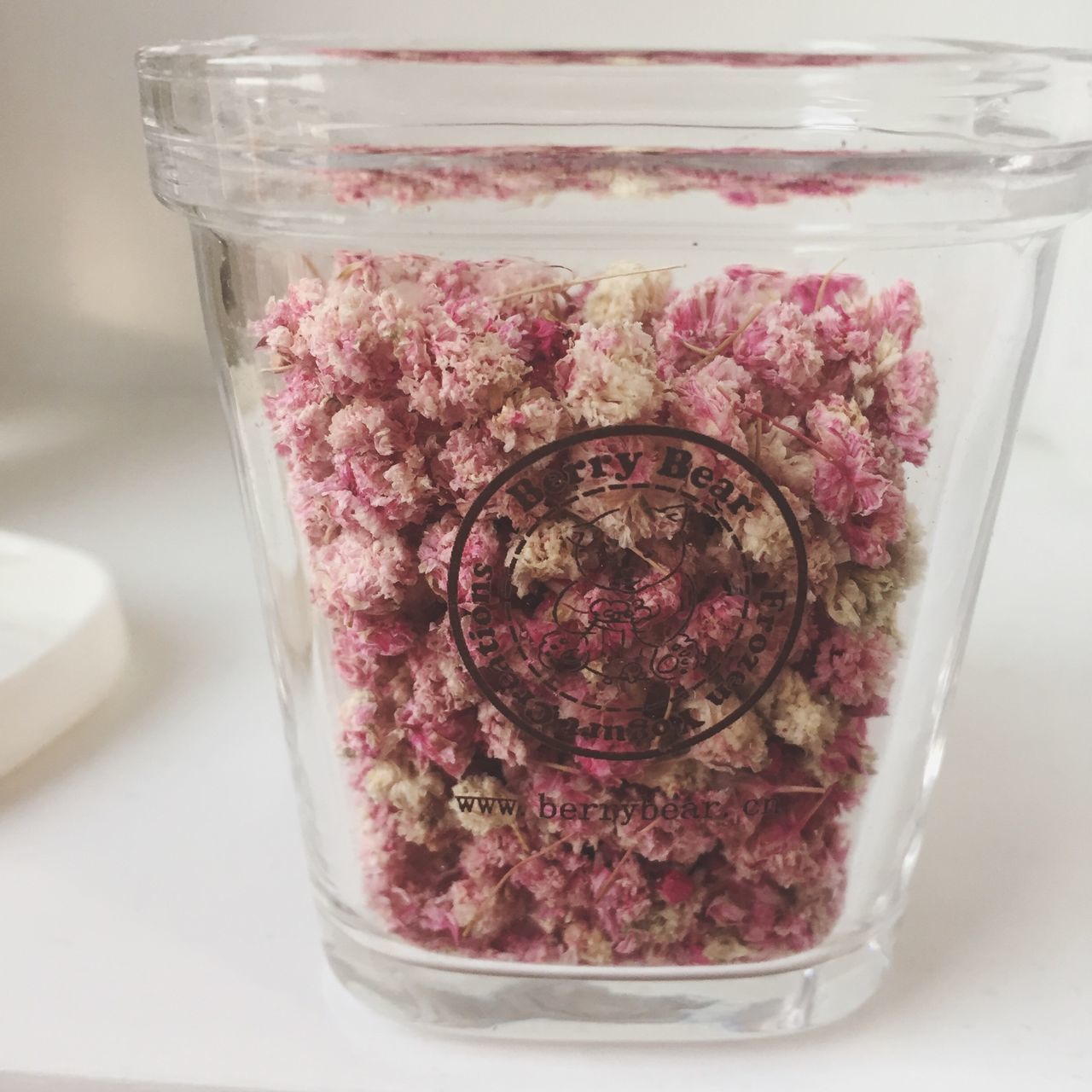 indoors, freshness, glass - material, food and drink, flower, transparent, close-up, table, still life, drinking glass, pink color, glass, red, refreshment, fragility, drink, jar, vase, no people, high angle view