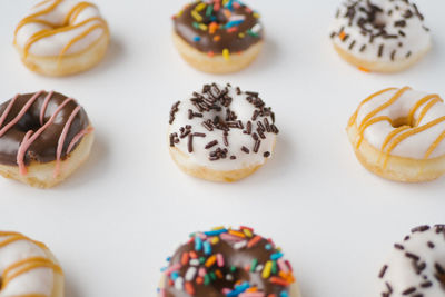 Close-up of donuts on white background