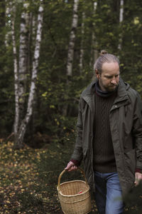 Man picking mushrooms