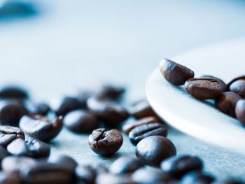 Close-up of coffee beans on table