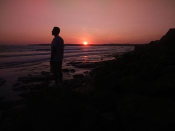 Silhouette of people on beach