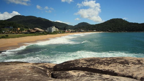 Scenic view of beach against sky